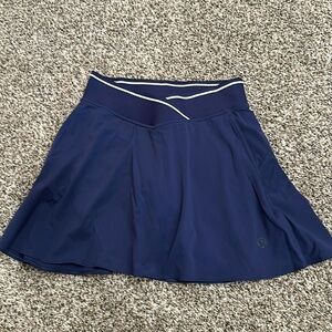 Lululemon Tennis Skirt
Size 2
Navy 
Built in shorts
Great condition